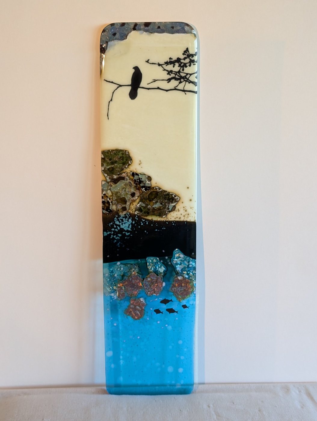 Tideline, a tall fused glass panel